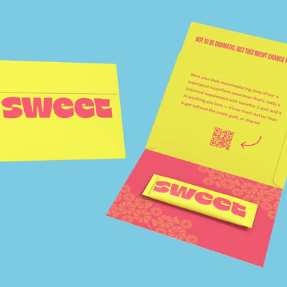 A SWEET Love Letter — opened yellow envelope with a note reading Meet your daily mouthwatering dose of joy, with QR code
