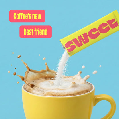 A SWEET stick packet pouring sweetener into a splashing coffee mug, text reads Coffee's new best friend