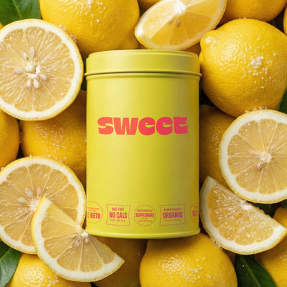 SWEET tin nestled among whole and sliced lemons with green leaves